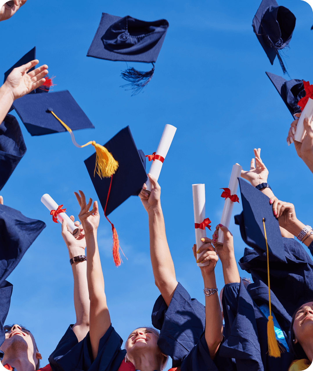 graduation hat in air
